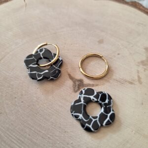 Charm fleur noir marbré