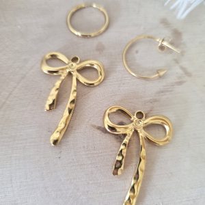 Charm acier nœud or